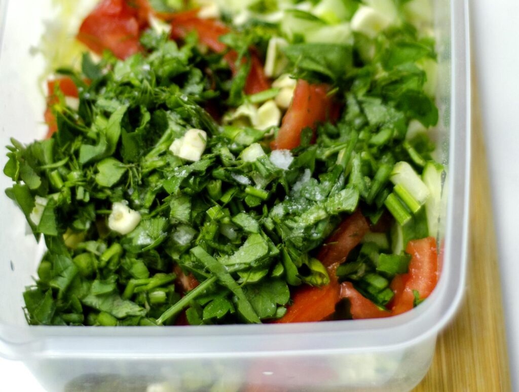 a bowl of vegetables and greens