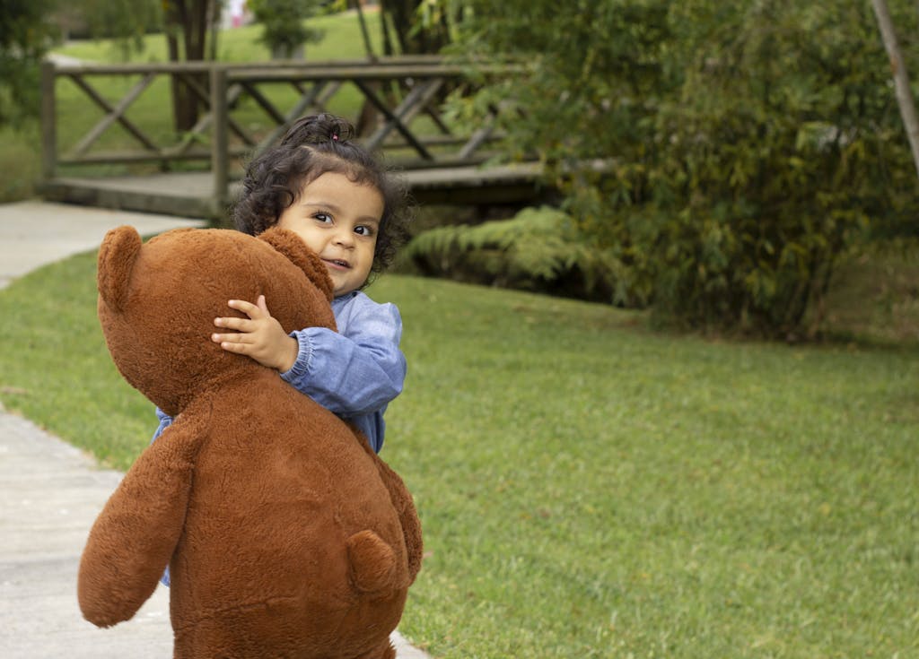 Little Girl with a Teddy Bear