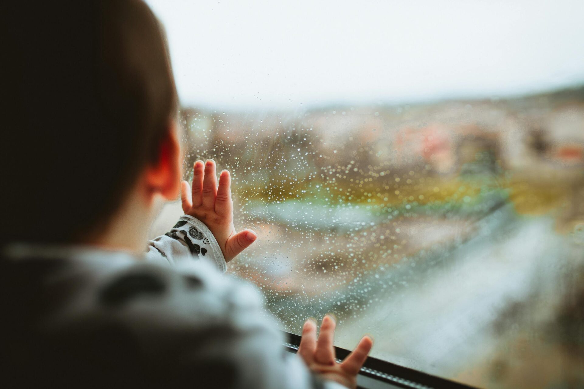 a child looking out a window