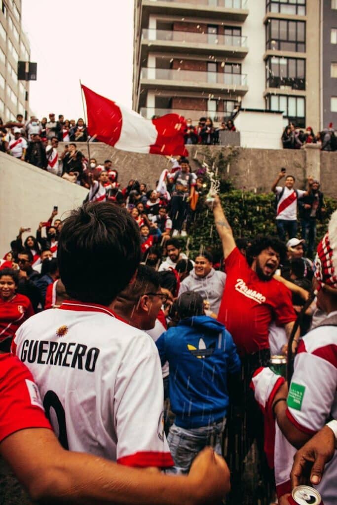 Best Places to Watch World Cup 2026 Matches Live: Top Spots If You Have No Ticket 6 Football fans celebrating together in a city during a World Cup watch party