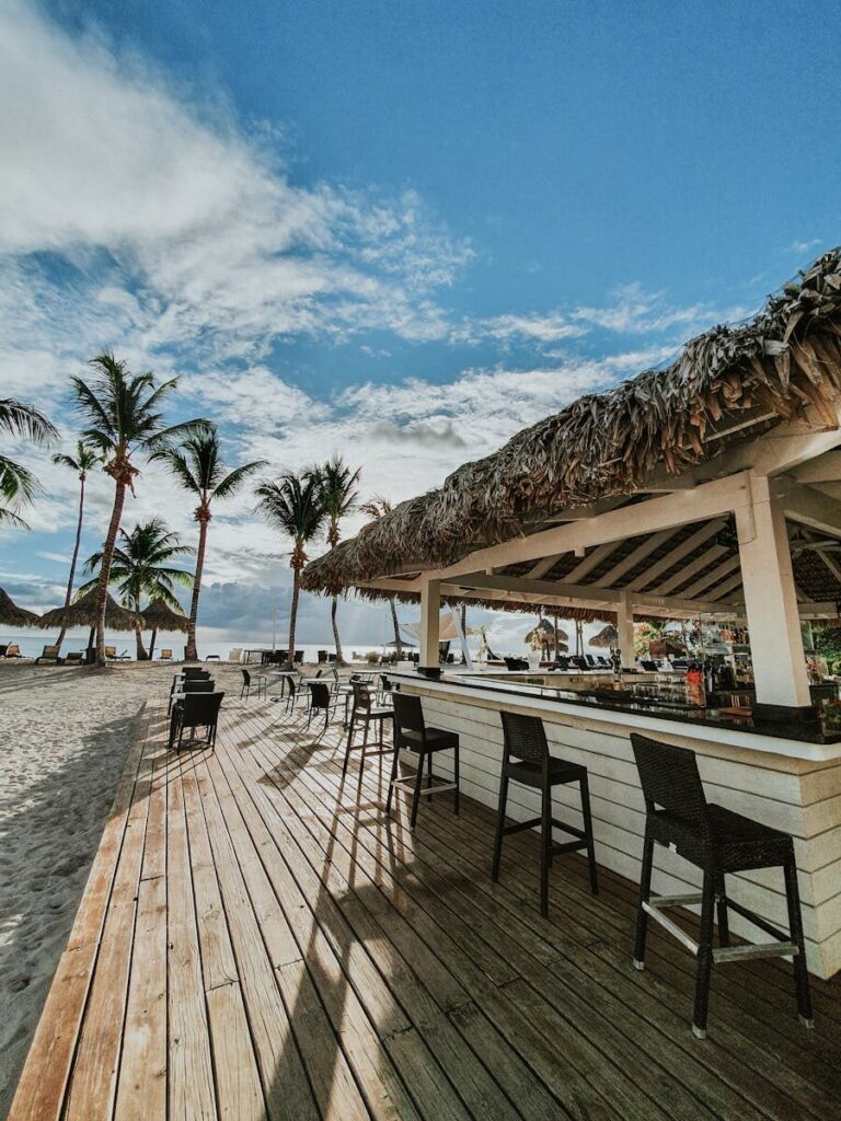 Outdoor beach bar in Miami with ocean views and seating area