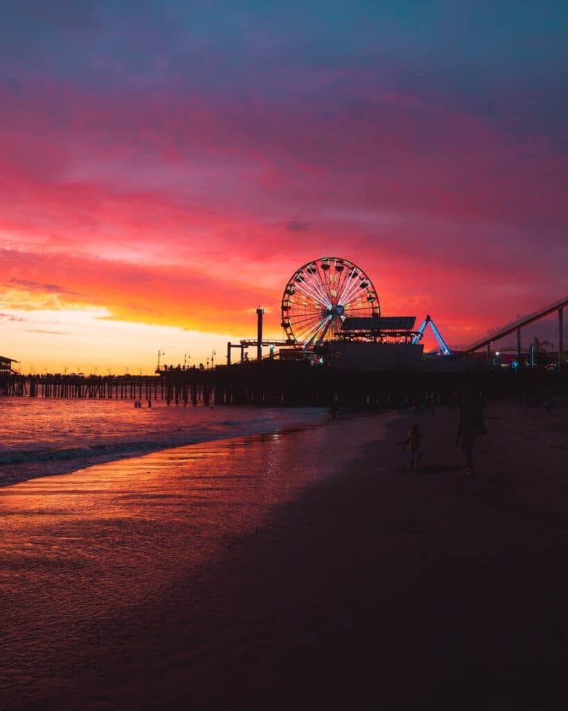 Santa Monica Pier with ferris wheel at sunset in Los Angeles