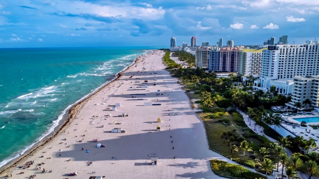 Aerial view of South Beach Miami with coastline, hotels, and ocean