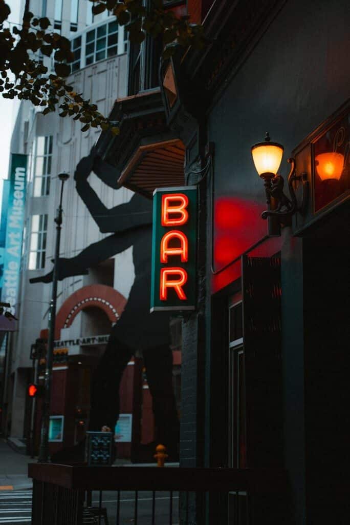 Neon bar sign in Capitol Hill Seattle at night