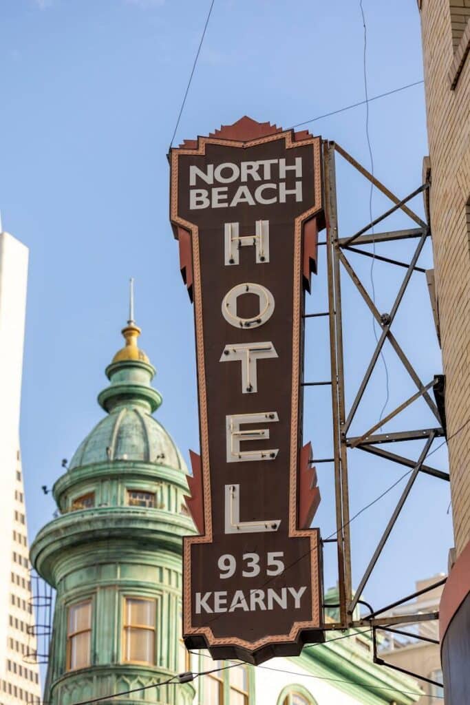 Last Minute Hotel Deals for World Cup 2026 Fans: What Still Works 1 Last-Minute Accommodation During the World Cup 2026 hotel sign in a busy city area