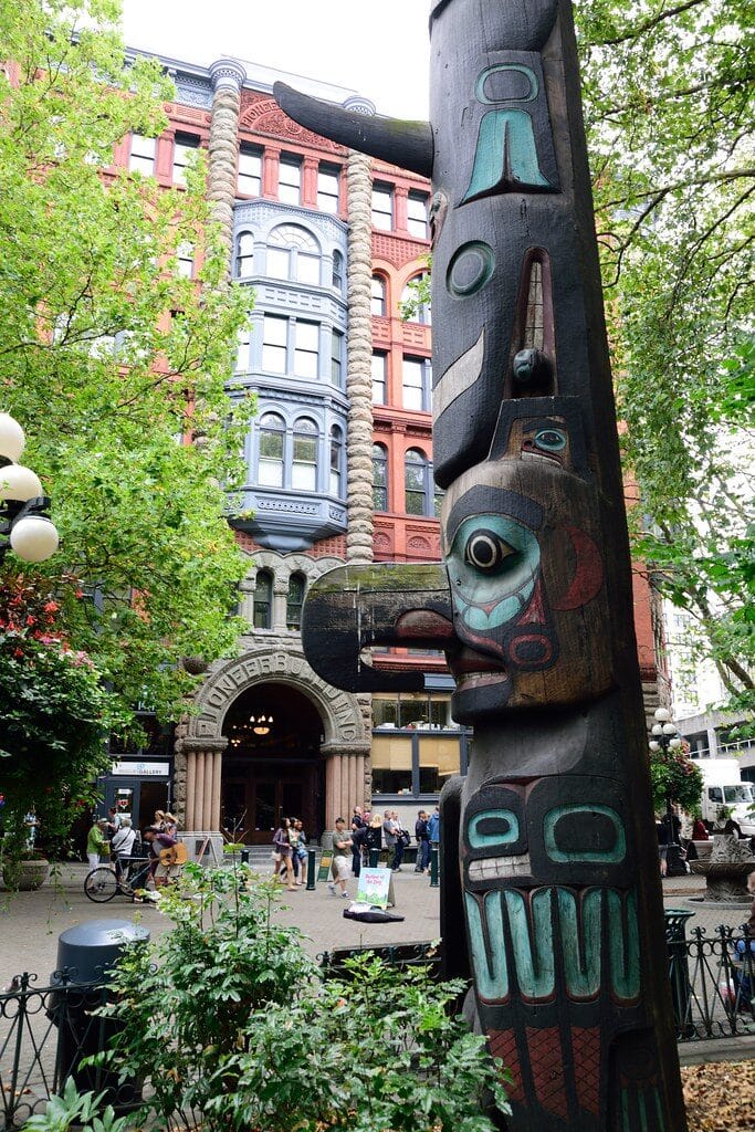 Historic Pioneer Square in Seattle with totem pole and red brick buildings
