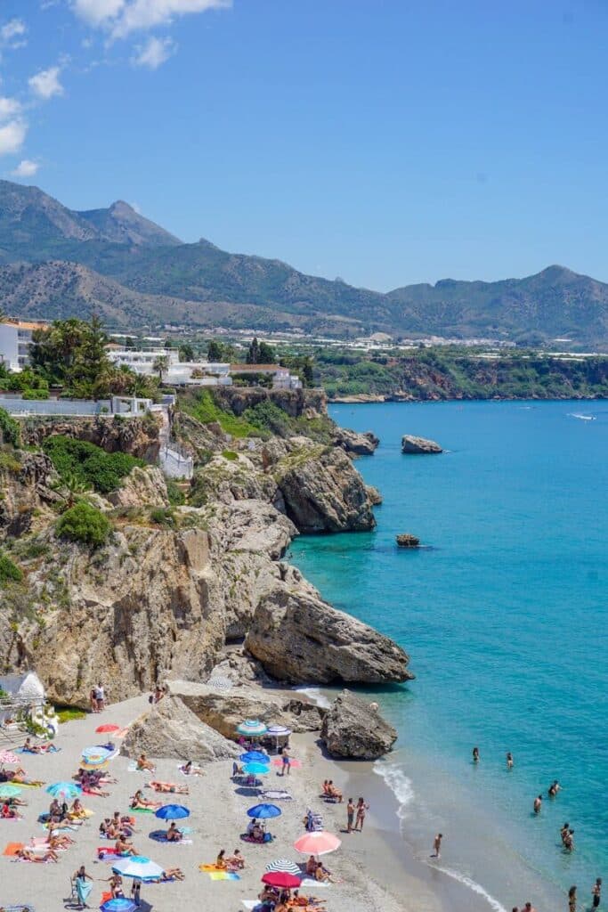 Costa del Sol beach with cliffs and turquoise water in southern Spain