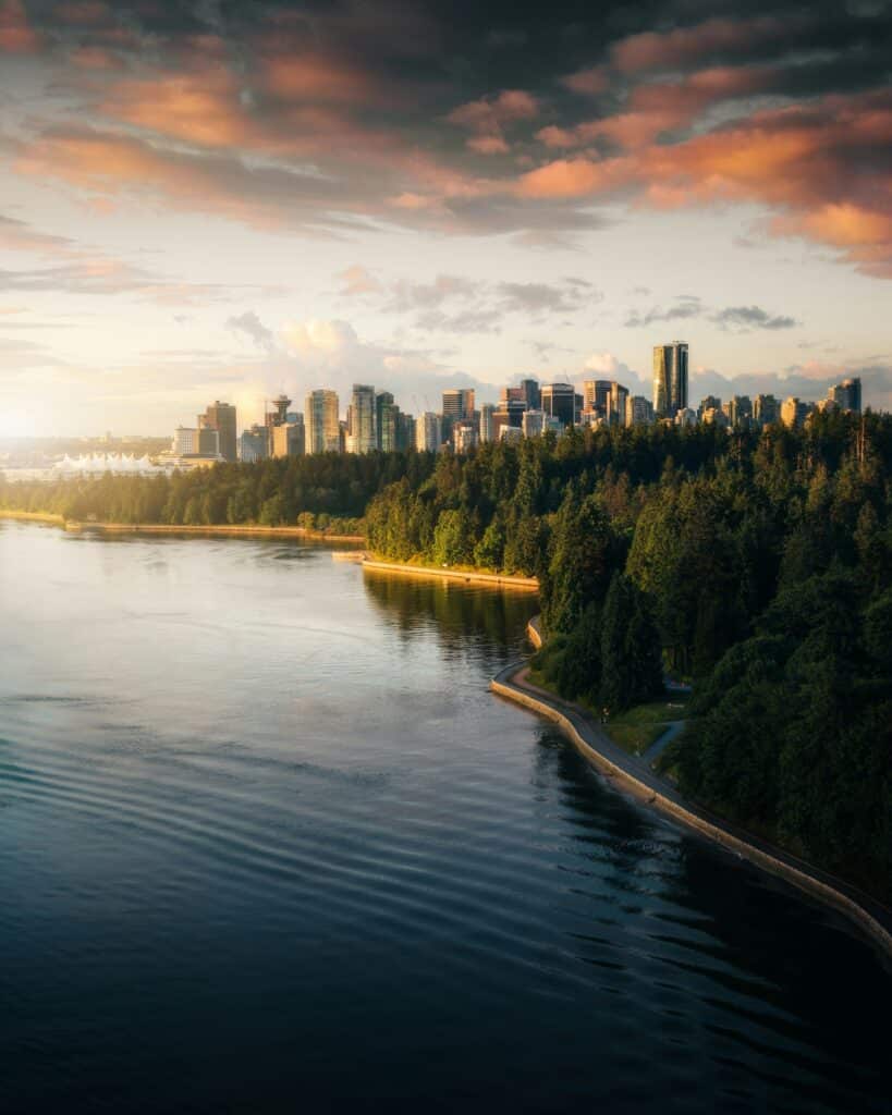 Vancouver skyline at sunset with waterfront and forest — one of the safest host cities for World Cup 2026 travel