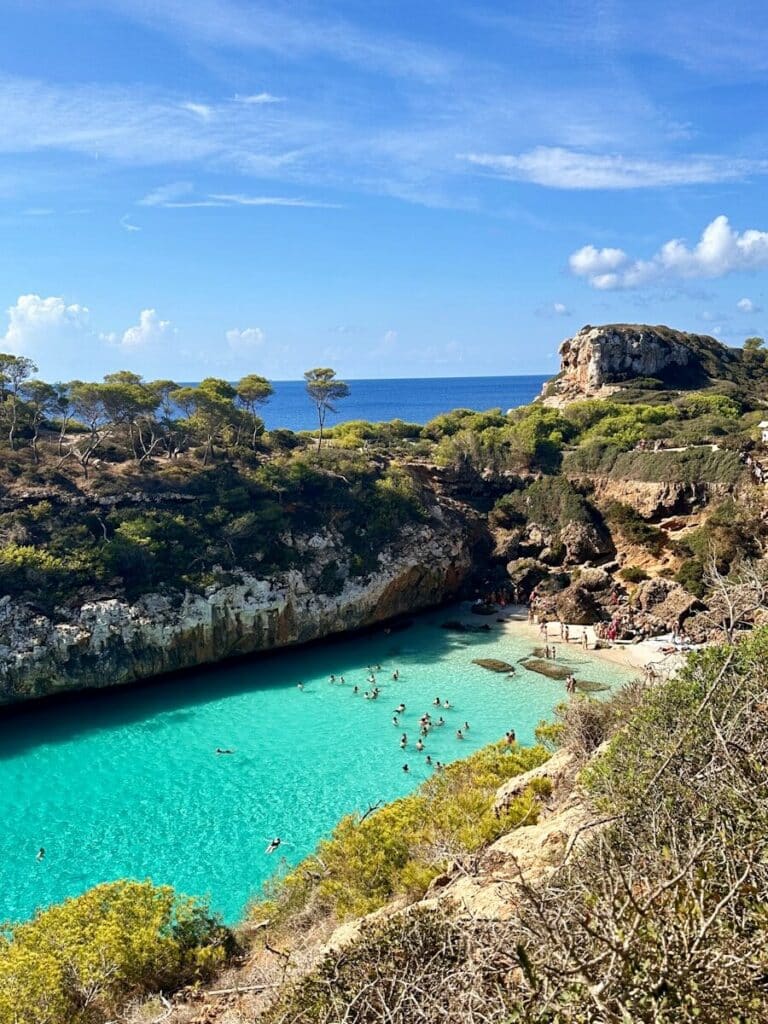 Mallorca hidden bay with turquoise water and rocky coastline Spain