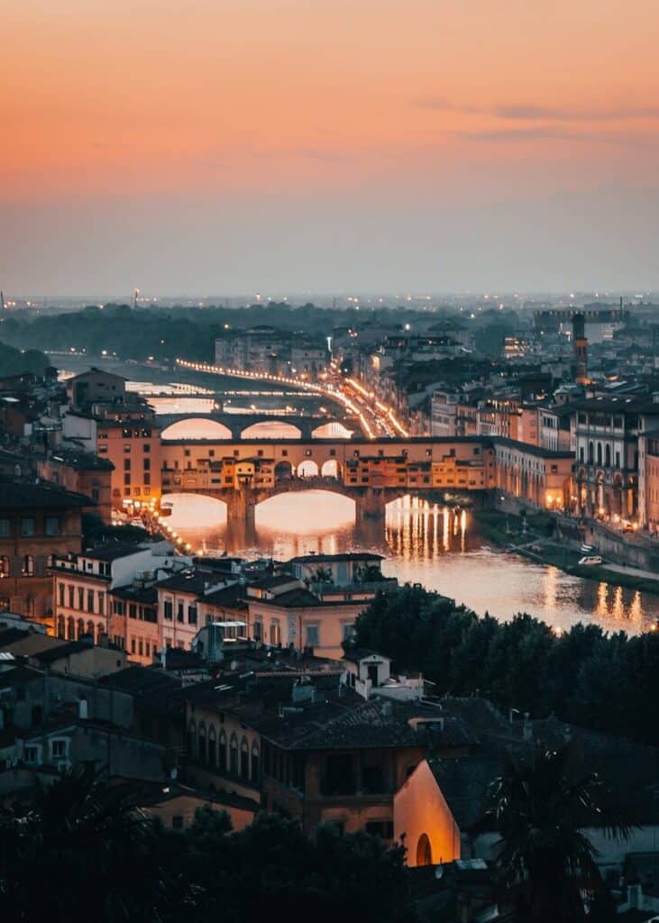 Sunset view over Florence with river and bridges