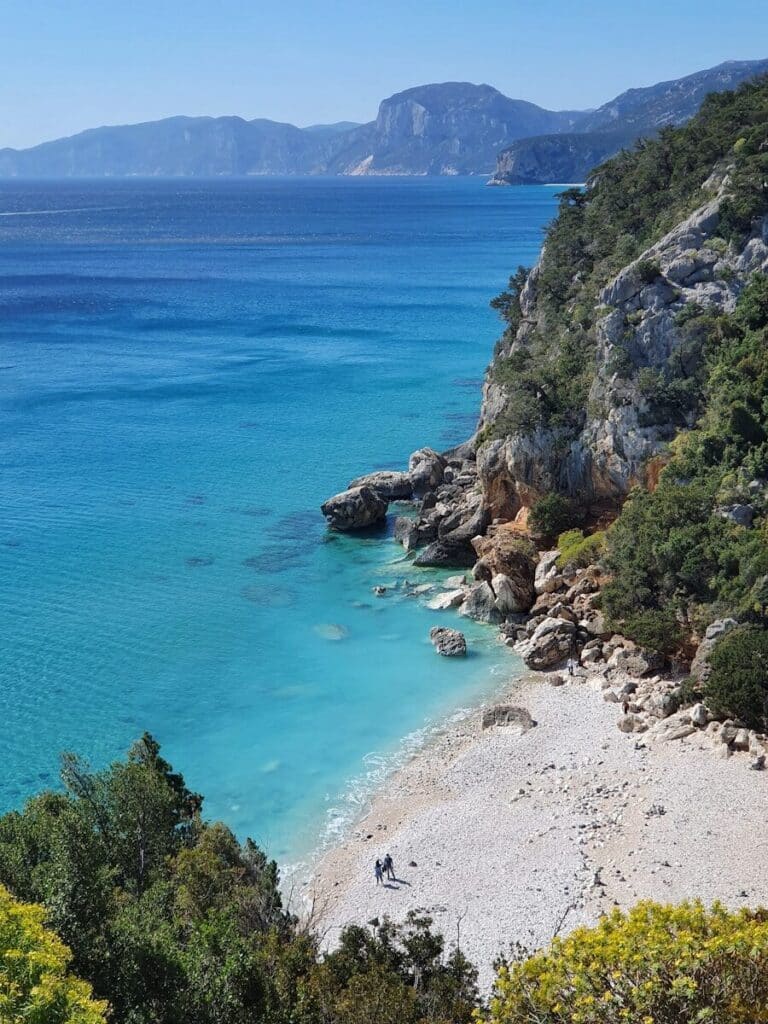 Beach coastline in Sardinia with clear blue water