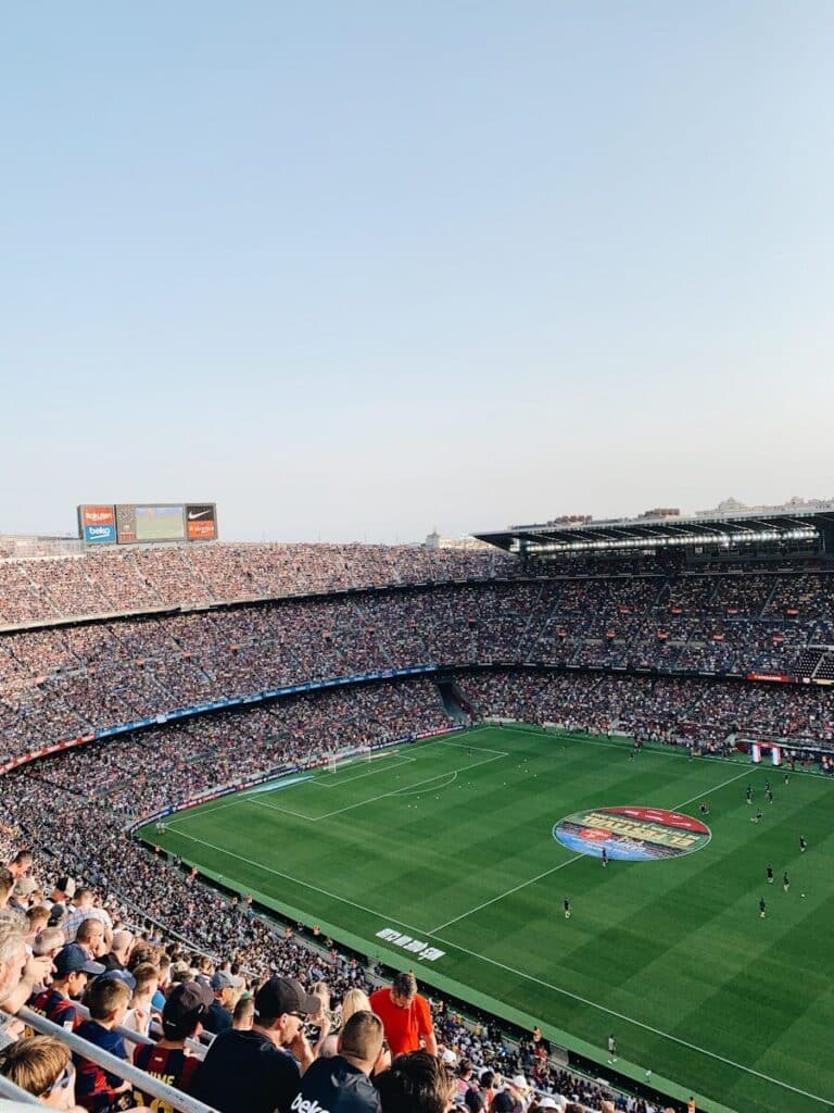 How to Plan a Last-Minute World Cup 2026 Trip (8-Week Countdown) 1 Packed football stadium during a major international match with thousands of fans in the stands
