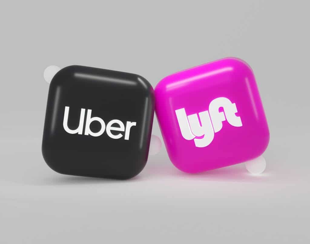 Best Apps to Install for World Cup 2026 on Your Phone (Download These Before You Fly) 4 Uber and Lyft ride sharing apps on smartphone used for transport during travel
