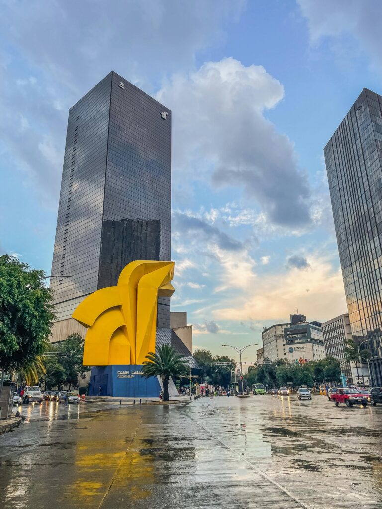 World Cup 2026 Weather Explained: What to Expect in All 16 Host Cities 7 Mexico City street after heavy rain showing wet roads and cloudy skies during the World Cup 2026