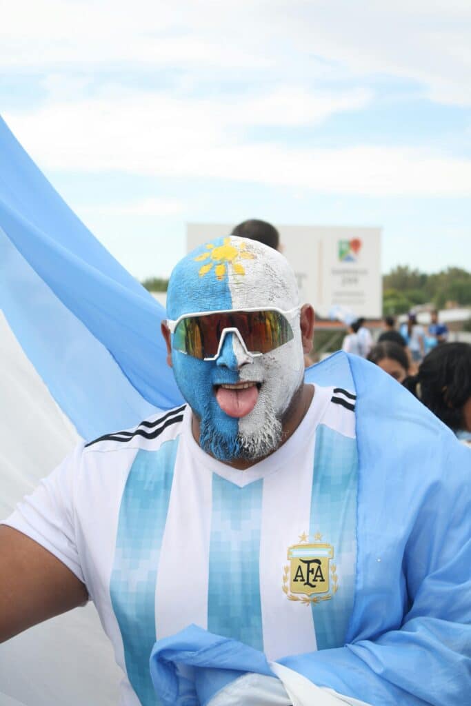 How Busy Will the World Cup 2026 Host Cities Be? (What to Expect) 5 Football fan in national colors enjoying the World Cup atmosphere without large crowds