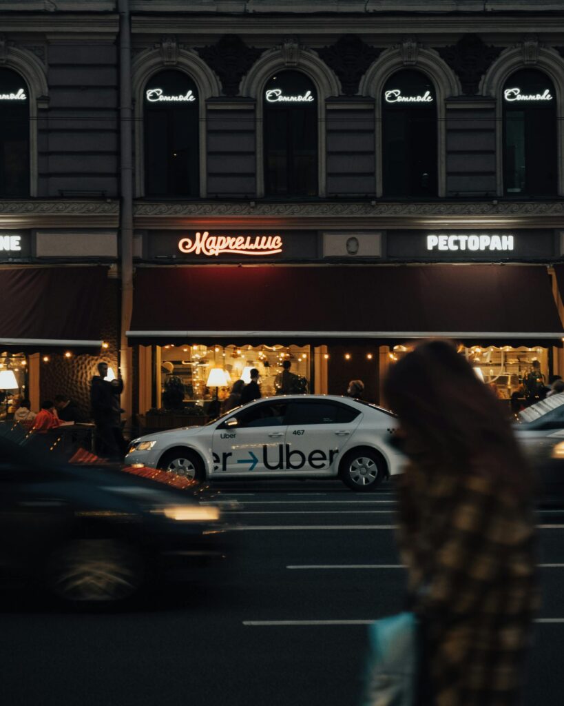 Uber car in a city at night — safest transport option and key safety tip for World Cup 2026 travel in Mexico