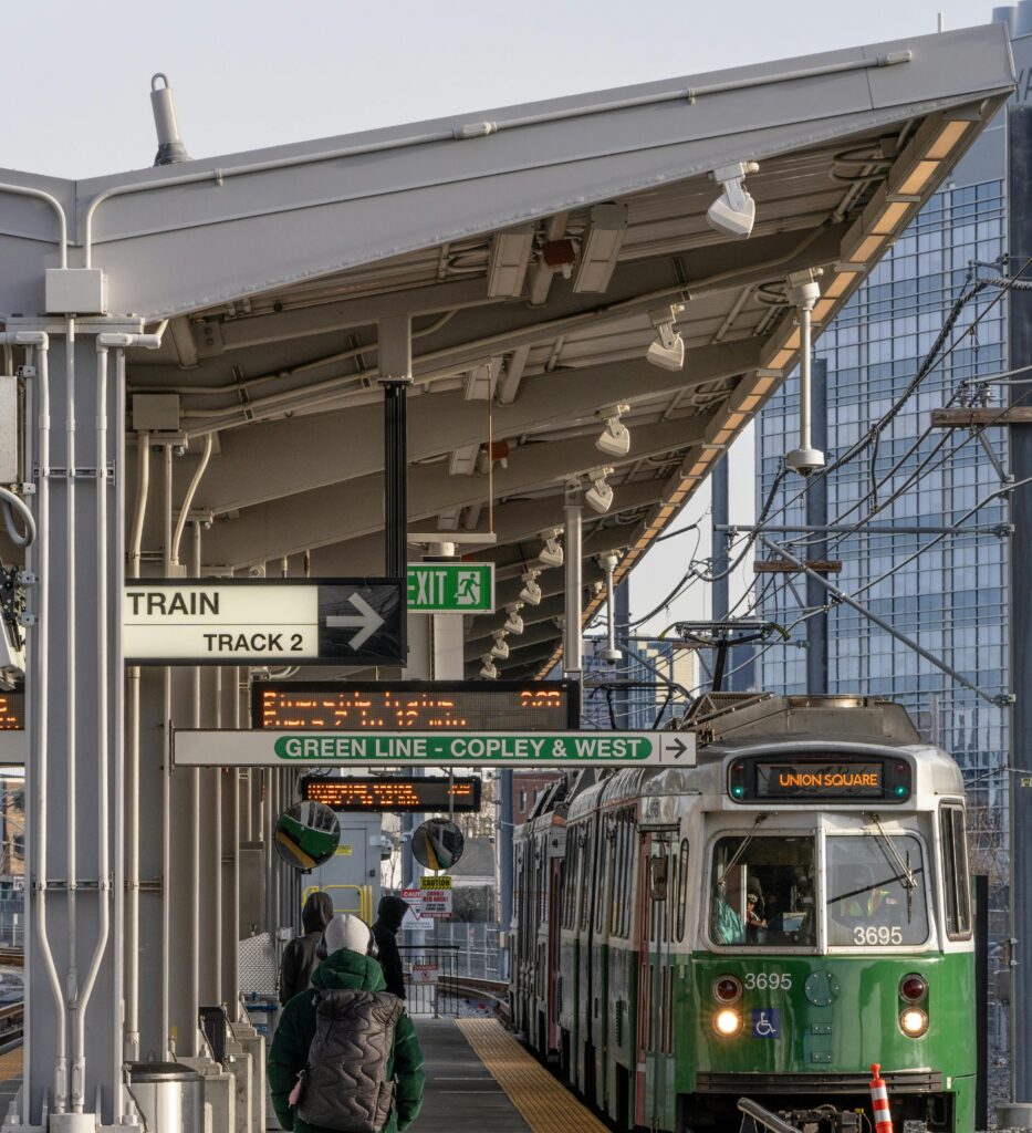 MBTA train at a station in Boston, highlighting commuter rail and public transport options for World Cup 2026