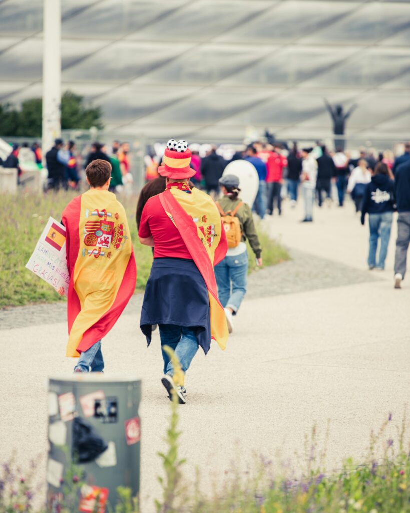 How Busy Will the World Cup 2026 Host Cities Be? (What to Expect) 4 Football fans walking calmly toward a stadium before a match in a less crowded host city