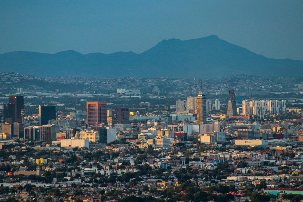Mexico City skyline with mountains in the background, a vast urban area where Uber is the easiest way to get around during World Cup 2026