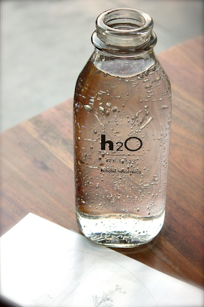 Bottled water on a table — safe drinking option for travelers during World Cup 2026 travel in Mexico