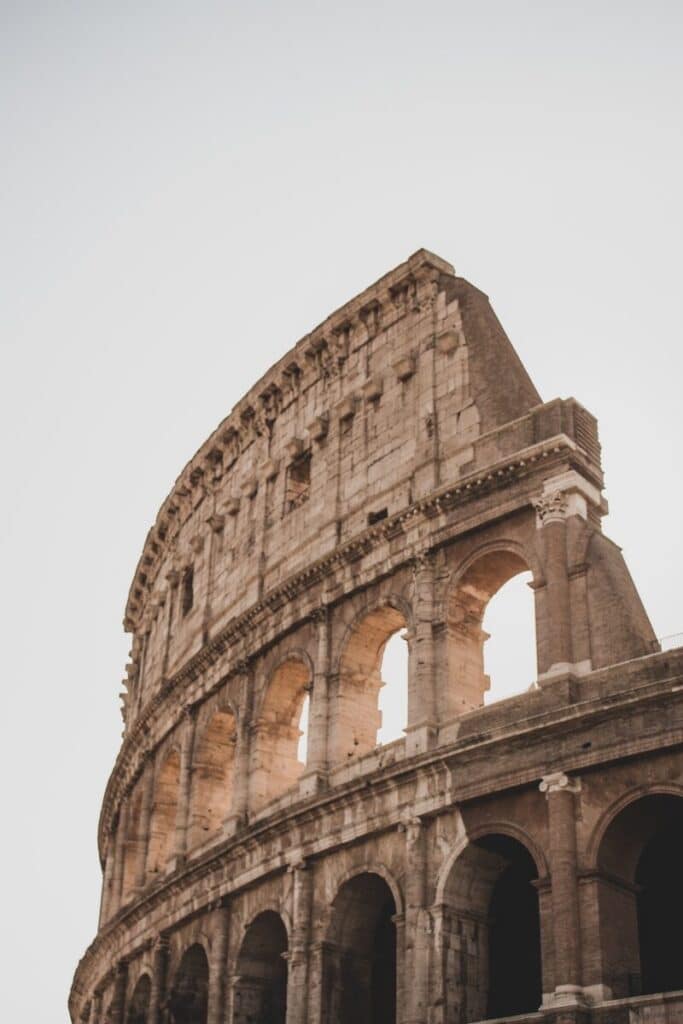 Colosseum in Rome with clear sky and tourist viewpoint