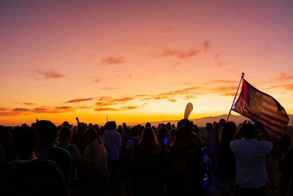 Best Places to Watch World Cup 2026 Matches Live: Top Spots If You Have No Ticket 3 Crowd gathering at sunset to watch a football match outdoors during the World Cup