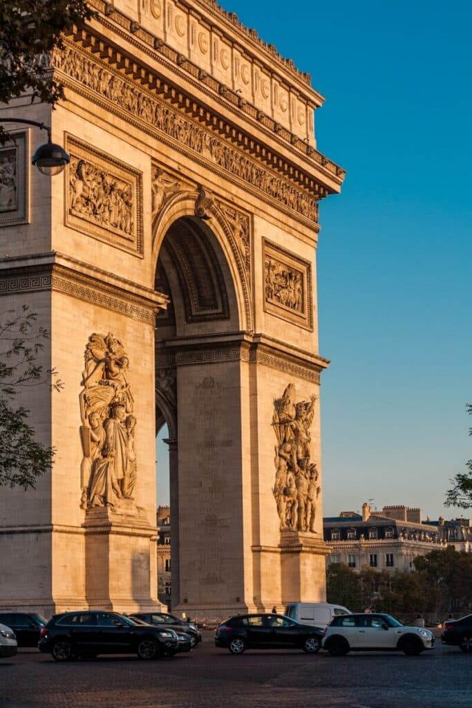 eSIM or Physical SIM in France? Pros, Cons & Best Pick for Travellers 2026 6 Arc de Triomphe Paris at golden hour with cars in foreground