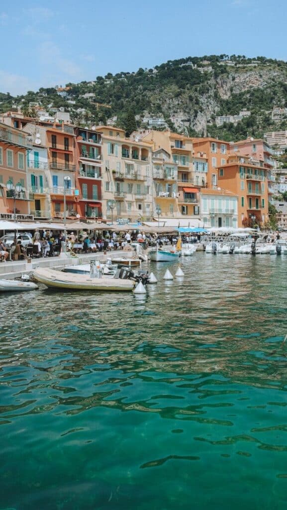 eSIM or Physical SIM in France? Pros, Cons & Best Pick for Travellers 2026 7 eSIM France colourful harbour village on the Côte d'Azur with turquoise water