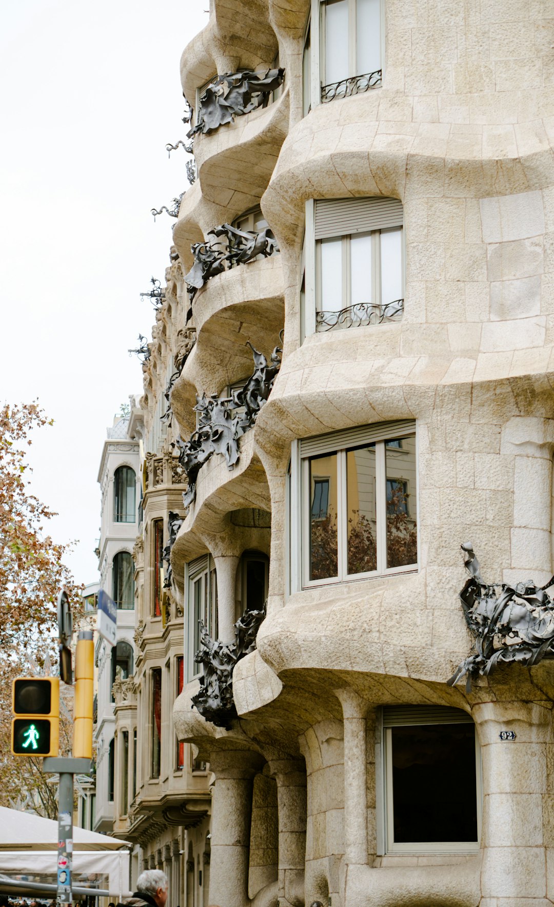 Tall apartment building with rows of windows in Barcelona