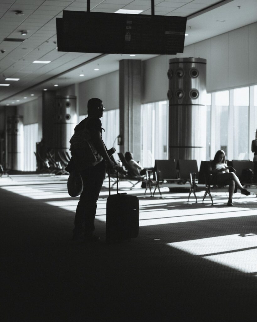 Traveler waiting at a Brazilian airport to sort internet brazil tourist connectivity
