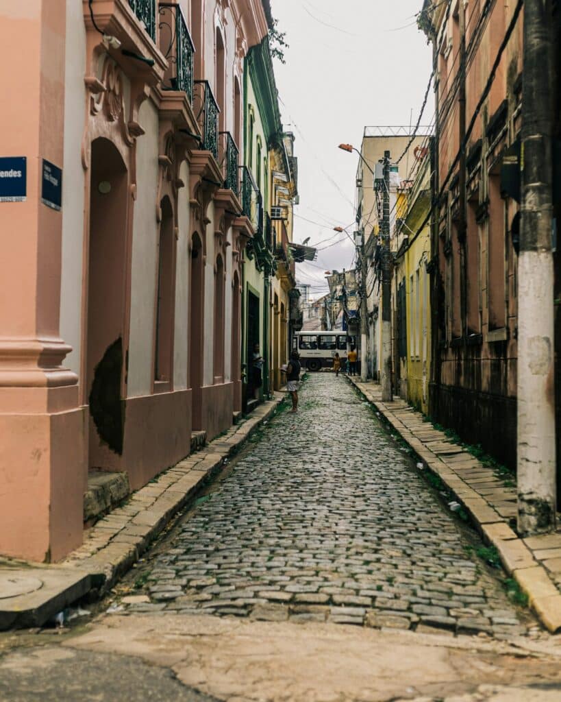 Narrow cobblestone street in a Brazilian city