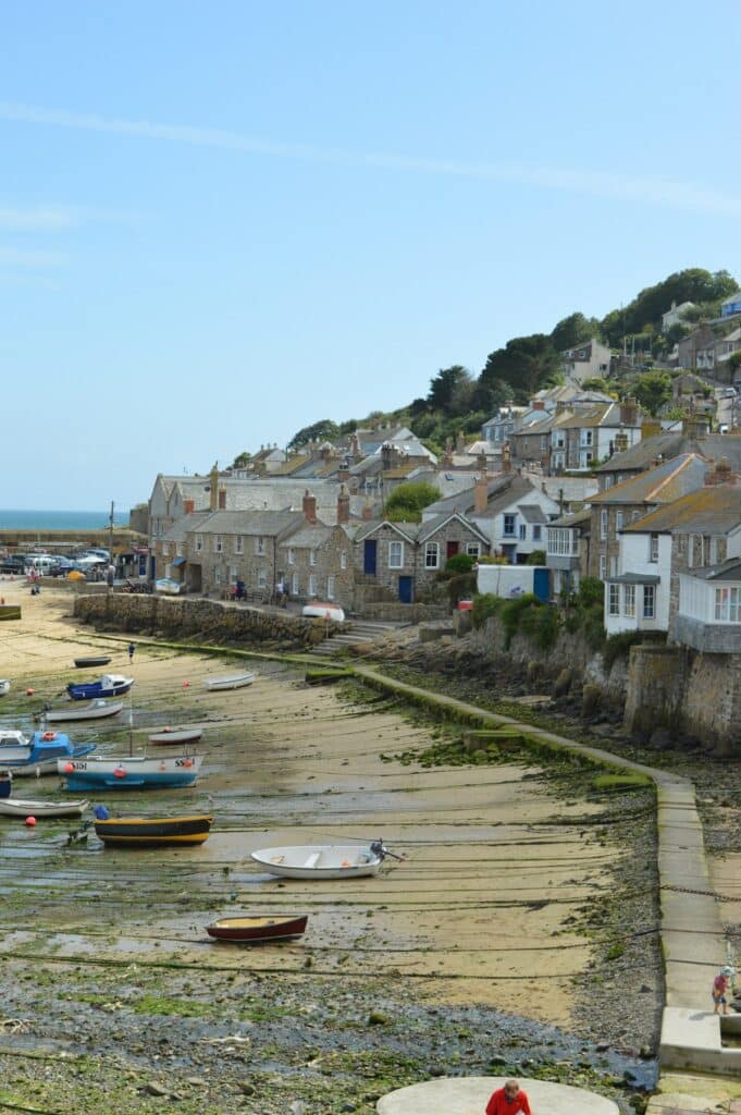 The fishing village of Mousehole hugs Cornwall's rocky shoreline