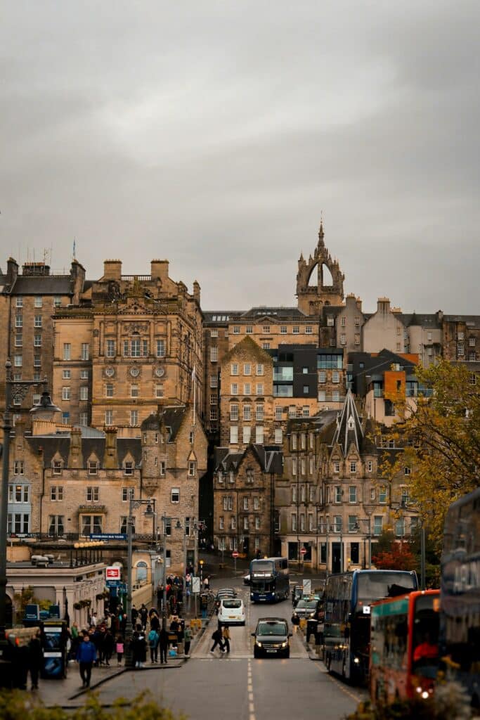 A cobblestone road winds through Edinburgh's historic old town