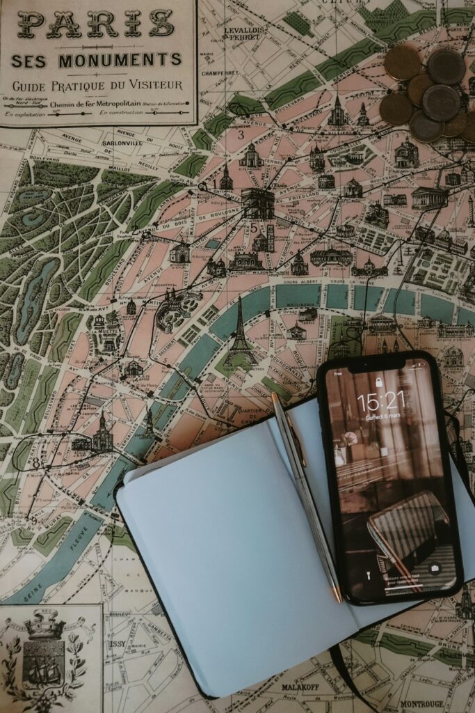 A travel guide lies open on a table during trip planning