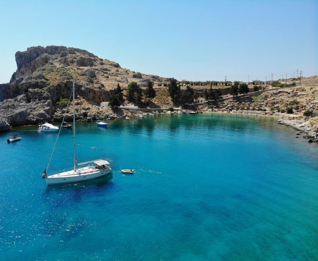 St Paul's Bay near Lindos in Rhodes with a small chapel on the headland