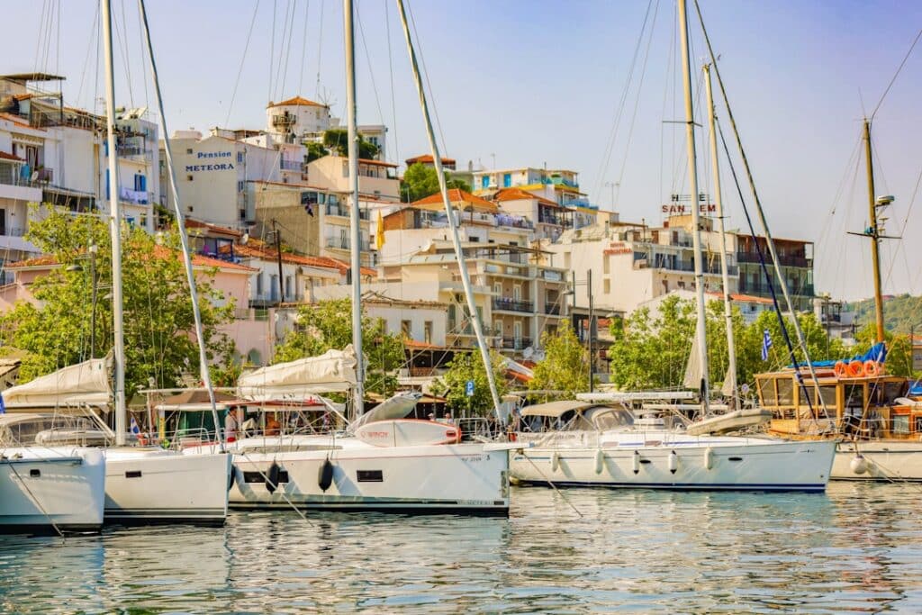 Coastal scene in Skiathos with clear water and a forested shoreline