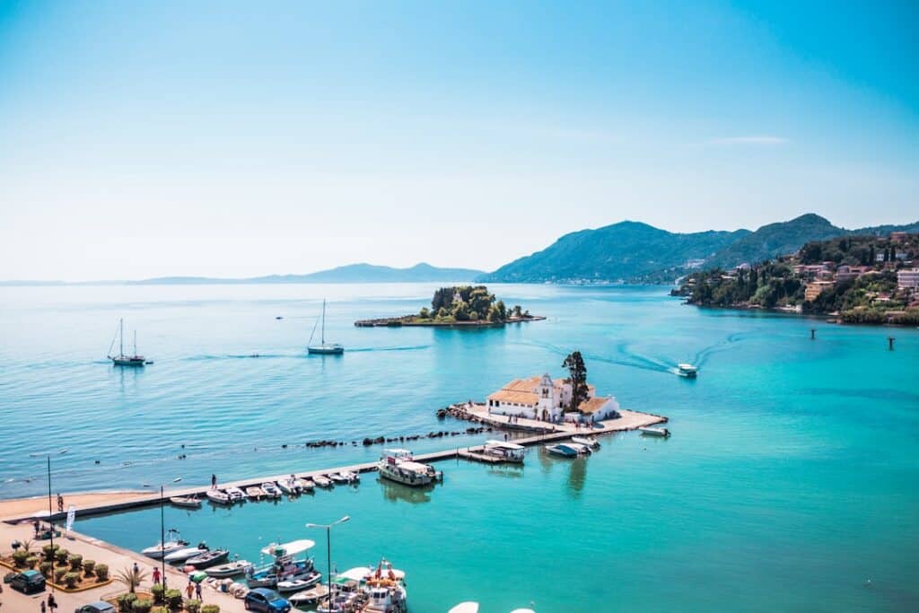 Boats moored along a dock in Corfu ahead of an island-hopping route