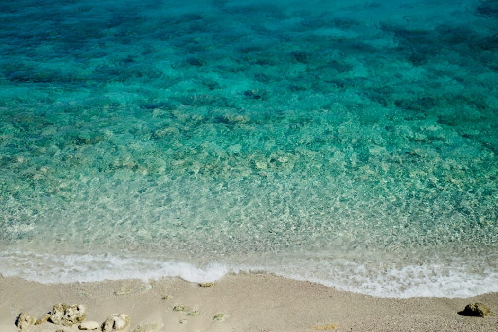 Beach near Rhodes with clear shallow water along the shoreline