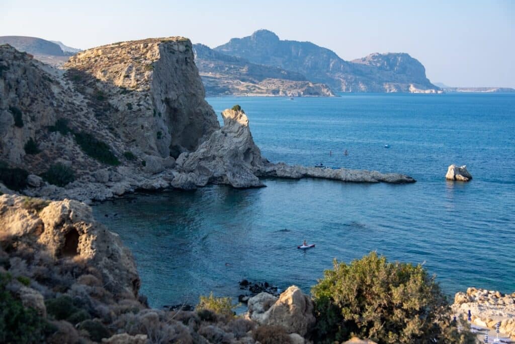 Coastal landscape near Rhodes with rolling hills meeting the sea