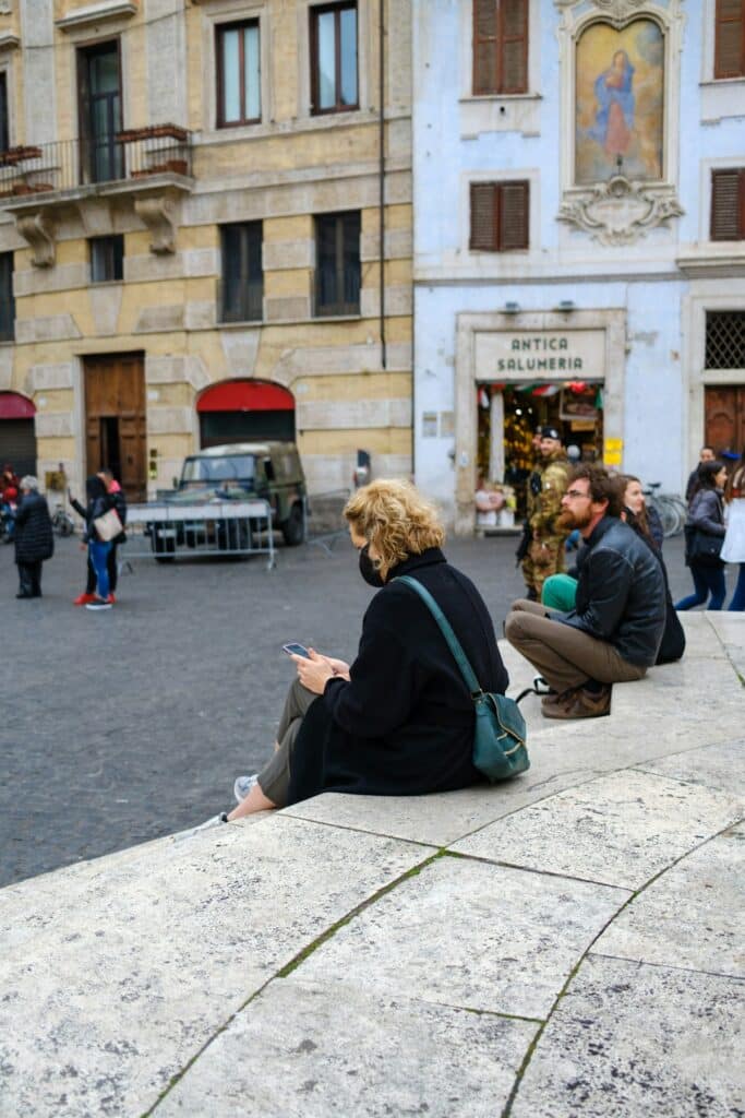 Traveler exploring a busy street in Rome