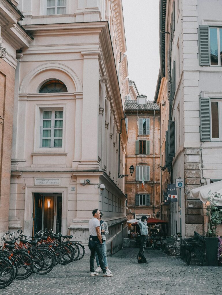 Travelers pausing on a lively Italian street