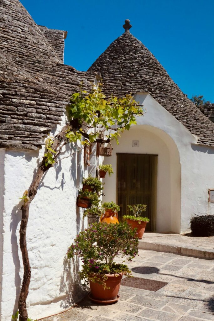 Trulli houses lining a street in Alberobello