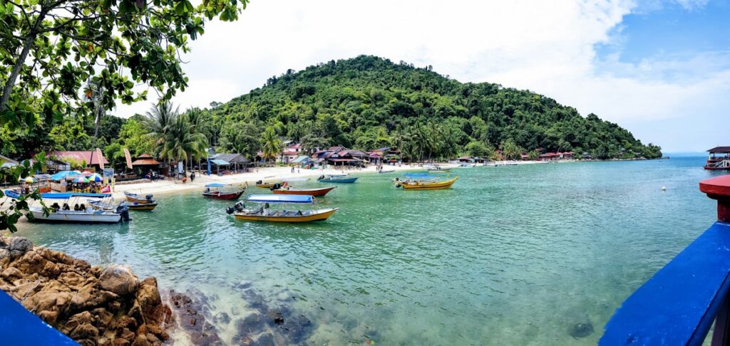 Where to Go in Southeast Asia in Summer: Best Destinations by Month 6 Passengers arriving by boat at Terengganu Jetty in Malaysia