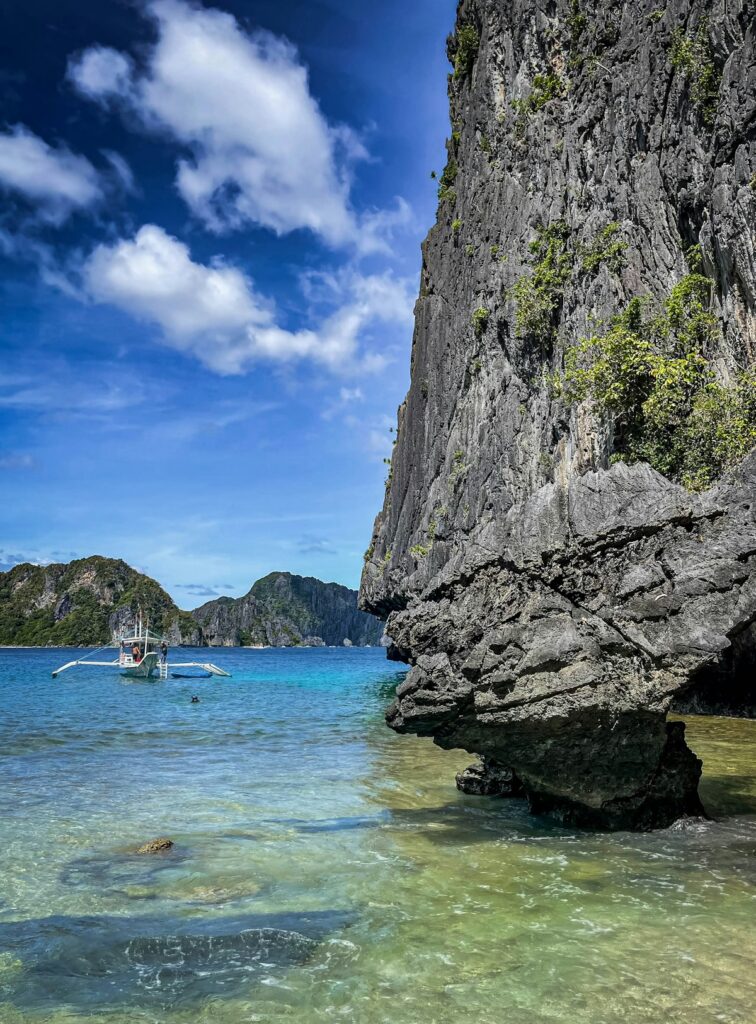 Where to Go in Southeast Asia in Summer: Best Destinations by Month 16 Scenic island coastline with clear water in Palawan