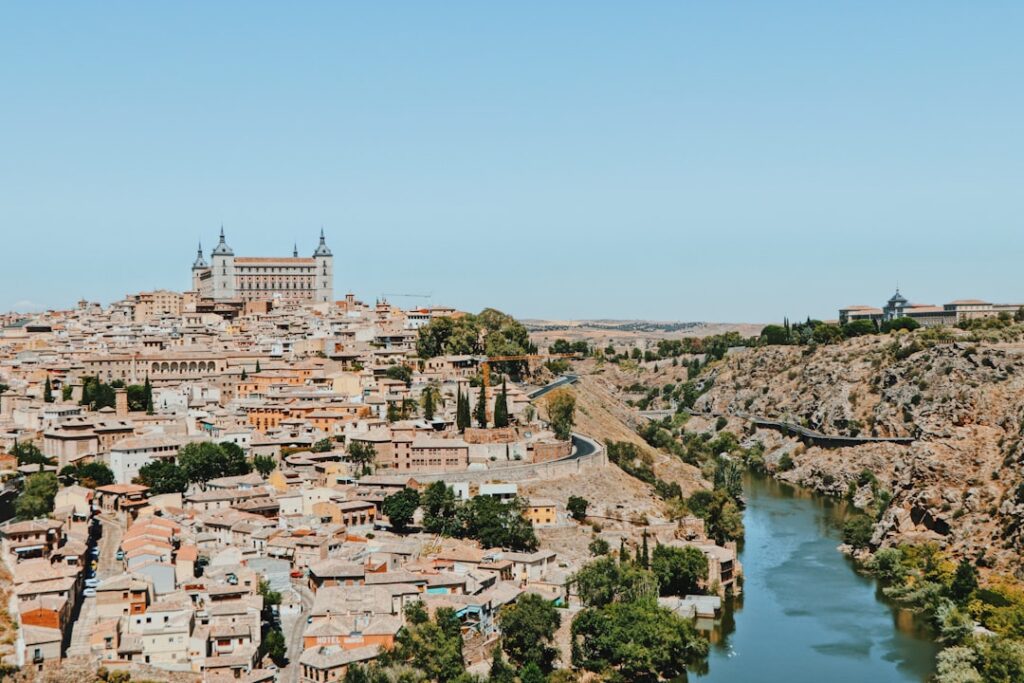 10-Day Travel Route Through Spain: The Essential Itinerary 3 Toledo's stone buildings packed along a hillside