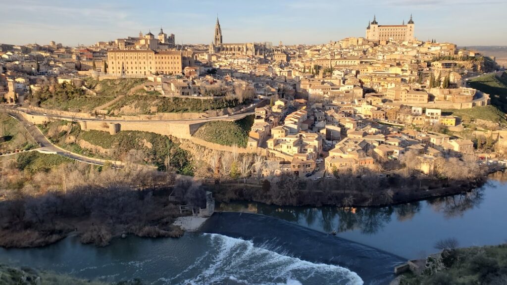 10-Day Travel Route Through Spain: The Essential Itinerary 4 Toledo's skyline framed by the surrounding countryside