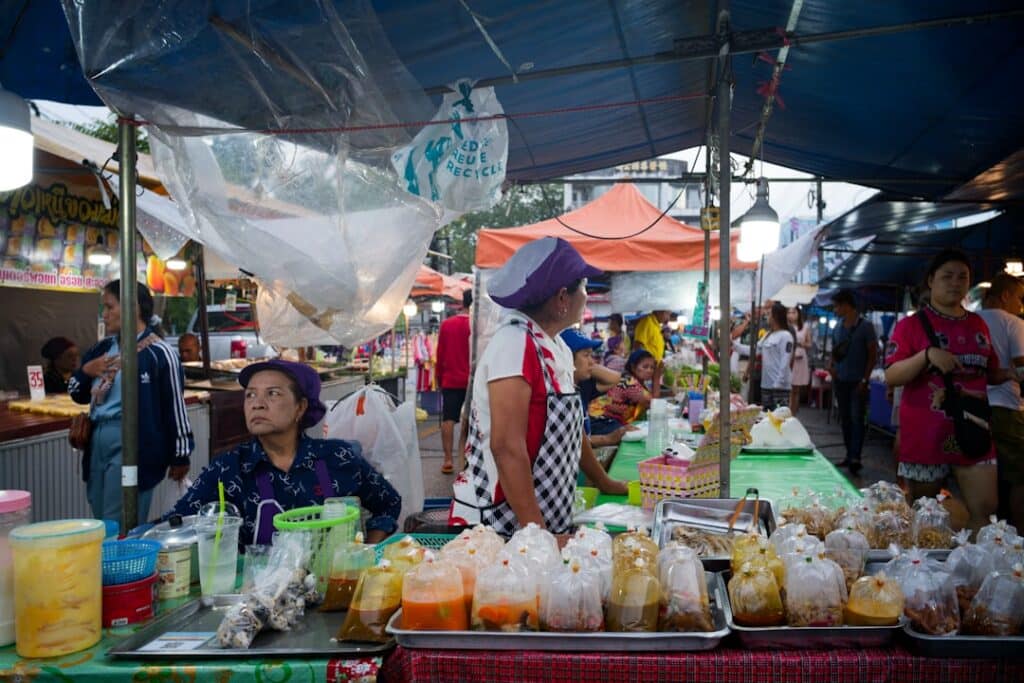 Busy outdoor food market stall in Thailand