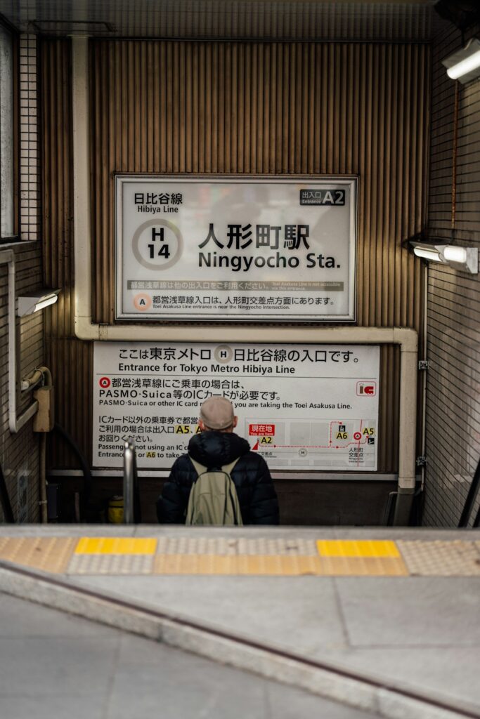 Traveler entering Ningyocho train station in Tokyo