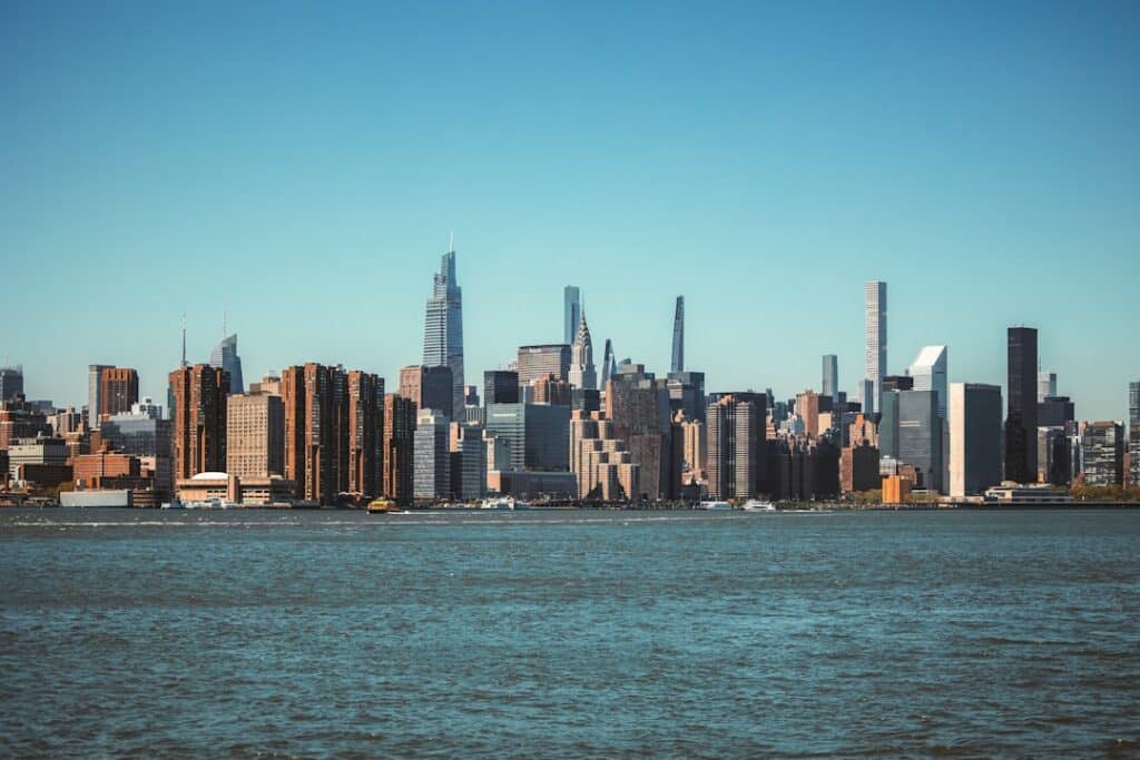 City skyline viewed from across the water at midday